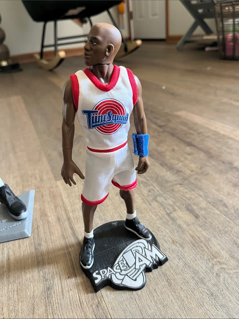1996 Warner Bros. Space Jam Michael Jordan Tune Squad action figure on stand